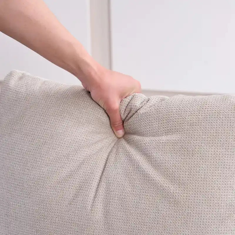 Beiger Leinen-Loungesessel mit freitragendem schwarzem C-Gestell aus Metall, Sitzkissen und Rückenkissen