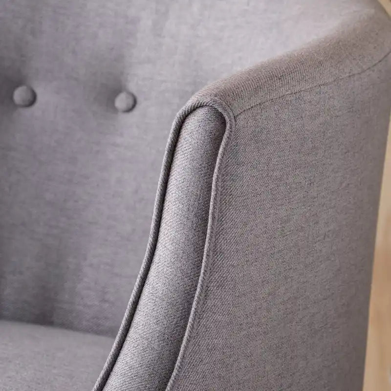 Poltrona club barrel in poliestere grigio, capitonné, profili tono su tono, gambe in betulla