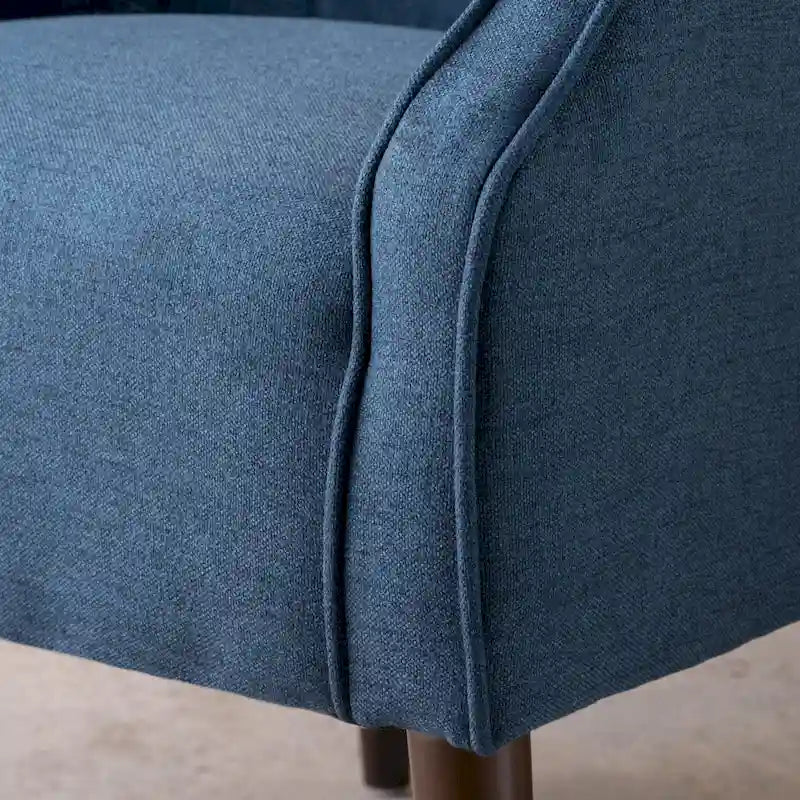 Poltrona club barrel in poliestere grigio, capitonné, profili tono su tono, gambe in betulla