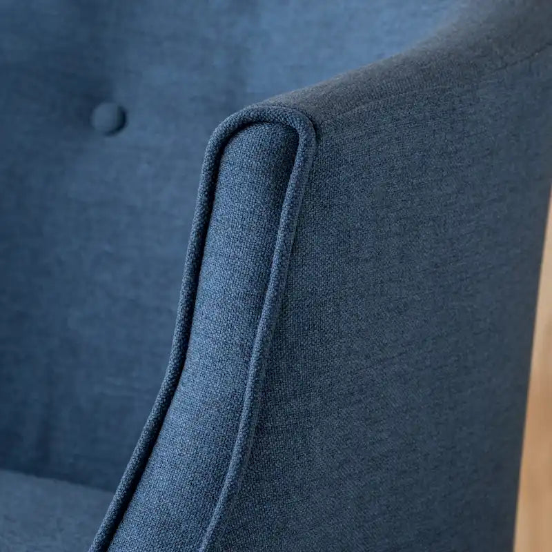Poltrona club barrel in poliestere grigio, capitonné, profili tono su tono, gambe in betulla