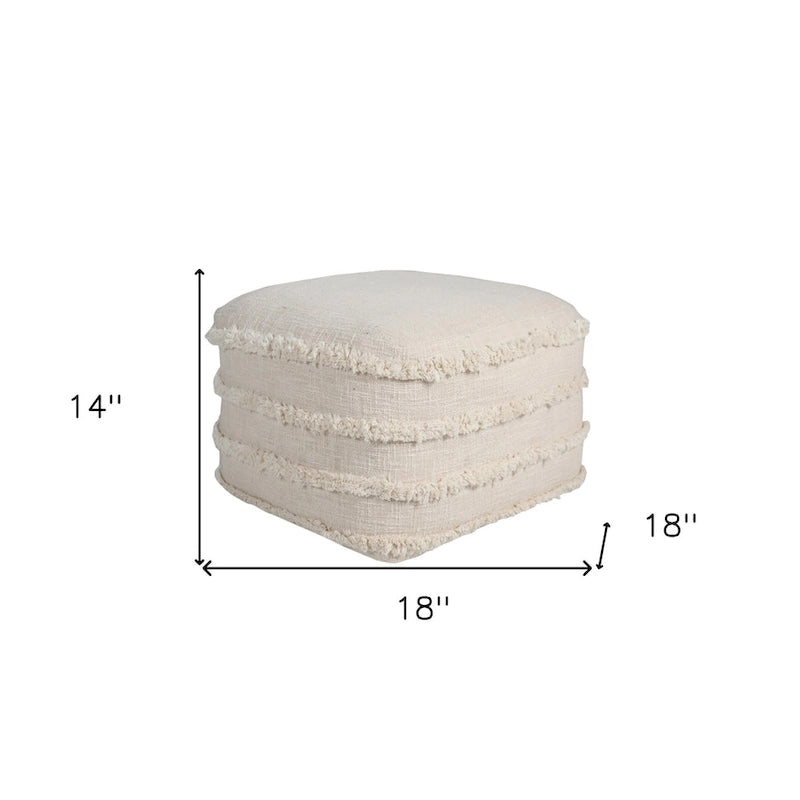 Würfelpouf und Hocker in Creme aus Baumwolle mit Knopfheftung, Fransen und Streifen im Boho-Stil, als Fußablage